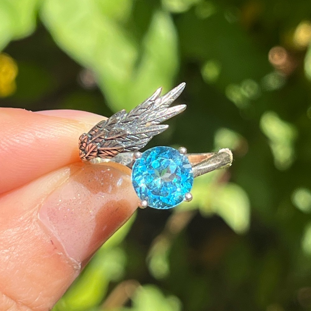 Sterling silver adjustable blue‎ topaz wing ring 2354